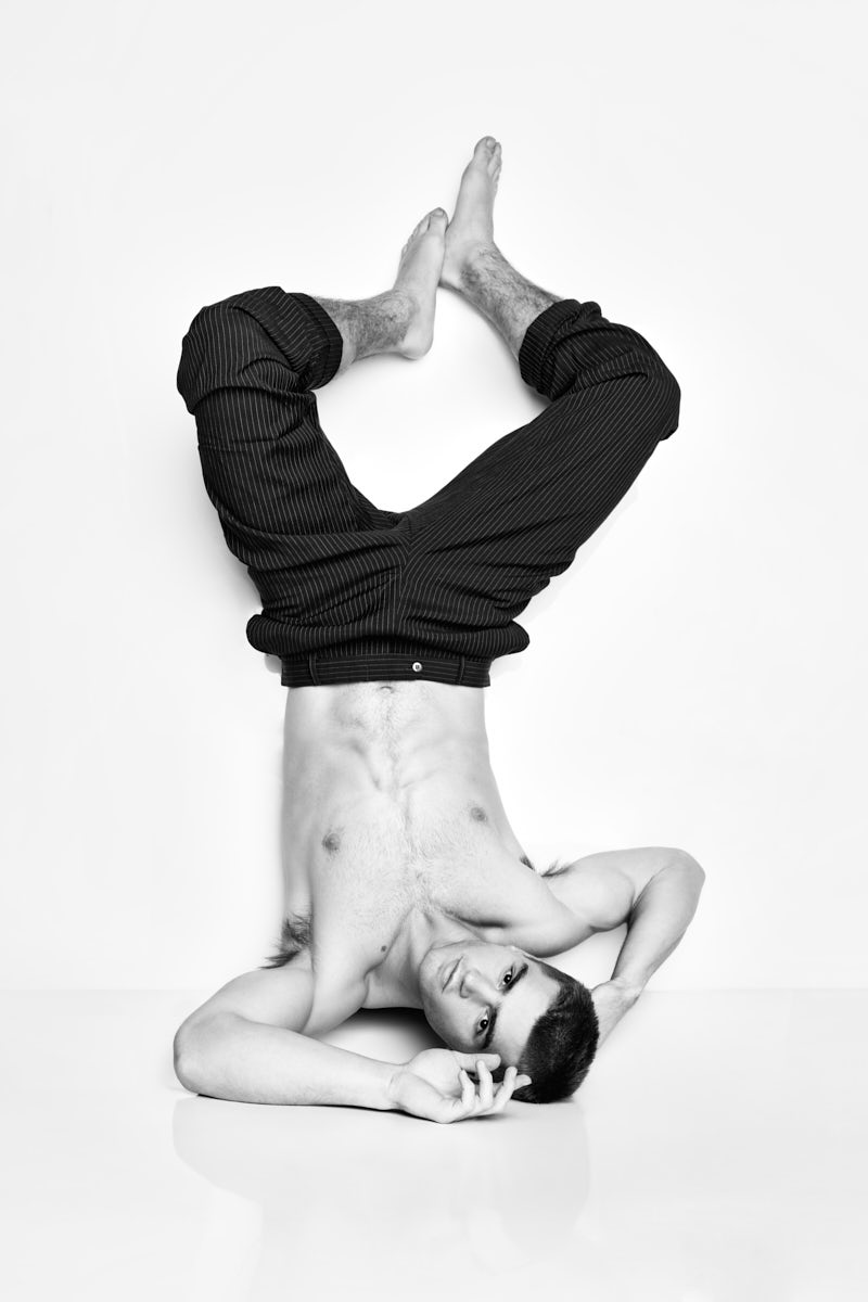 Black-and-white Fitness social media photography Chicago portrait of Josh Hudson in a sculptural inverted pose